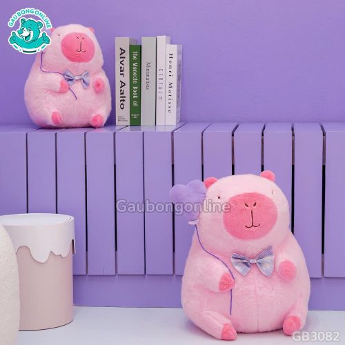 Gấu Bông Capybara Hồng Cầm Bóng Tim