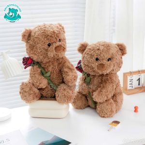 Gấu Ôm Cành Hoa Hồng Kẻ Đỏ đã được bán tại Gấu bông online